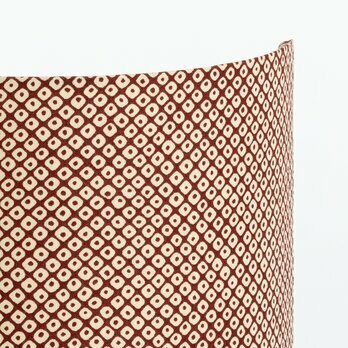 Detail of fabric half lamp shade for wall light Octave rouge