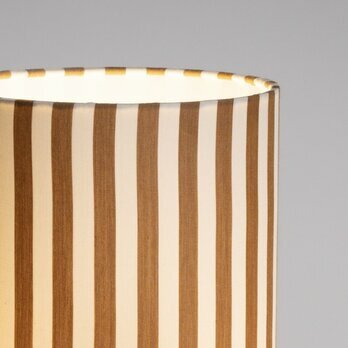 Detail of table lamp Sunray Wide ochre lit M